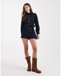Miss Selfridge - Mono Vaquero Corto Con Cinturón Y Lavado Azul Añil De -Azul Marino - Lyst