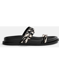 Pull&Bear - – flache sandalen aus leder mit kontrastierendem tierfellmuster - Lyst