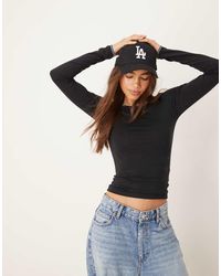 Miss Selfridge - Camiseta Negra De Manga Larga Con Pespuntes En Contraste De -Azul Marino - Lyst