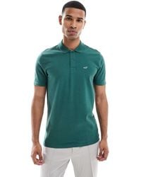 Hollister - T-Shirt A Maniche Corte Con Logo Sul Petto E Colletto Stile Polo - Lyst