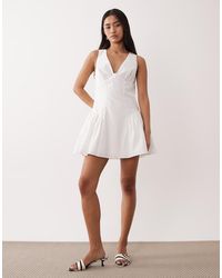 Nia - Highland V Neck Mini Dress - Lyst
