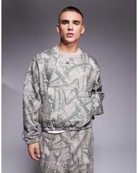 ASOS - Sweat court d'ensemble oversize à épaules tombantes et imprimé camouflage - Lyst