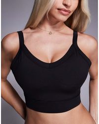 4505 - Fuller Bust Icon Active Medium Support Sports Bra With Removable Padding And Adjustable Straps - Lyst