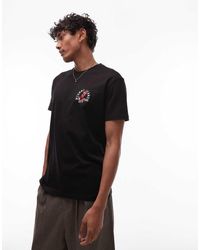 Tommy Hilfiger - Camiseta Negra Con Estampado Gráfico En La Parte Izquierda Del Pecho De - Lyst