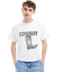 Reclaimed (vintage) - T-shirt oversize bianca con cowboy - Lyst