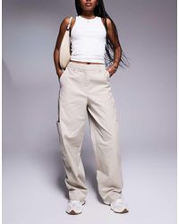 ASOS - Pantalones De Sastre Color Moca De Corte Herradura Con Detalle De Bolsillos Utilitarios De -Neutro - Lyst