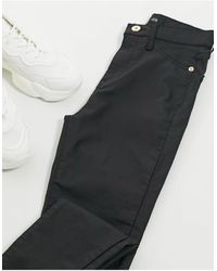 River Island – enge, beschichtete jeans mit hohem bund - Schwarz
