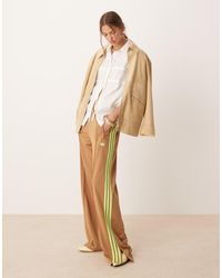 adidas Originals - Pantalones De Chándal Beis Y Verde Lima Firebird Loose De -Neutro - Lyst