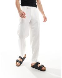 ASOS - Pantaloni oversize affusolati eleganti bianchi - Lyst