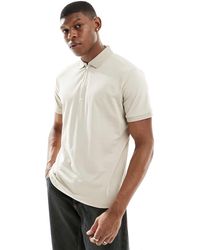 SELECTED - Polo à col zippé - crème - Lyst