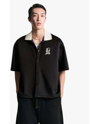 Bershka - Camicia Squadrata A Maniche Corte Nera Con Ricamo - Lyst