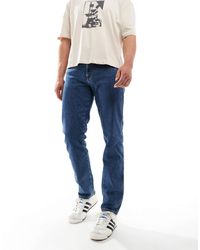 Wrangler - – texas – schmal geschnittene jeans - Lyst
