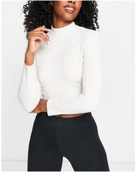 Nike - Nike Yoga Luxe Dri-fit Cropped Long Sleeve Top - Lyst