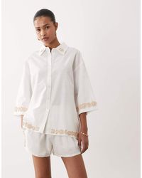 SNDY'S - Linen & Cotton Blend Flower Applique Trim Oversized Shirt - Lyst