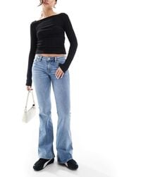 Monki - Katsumi - jean évasé à taille basse - délavé vintage - Lyst