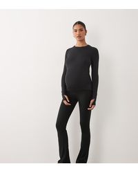 4505 - Maternity Icon High Waist Slim Kick Yoga leggings - Lyst