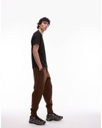 Mango - – schmal geschnittene jogginghose aus atmungsaktivem material - Lyst