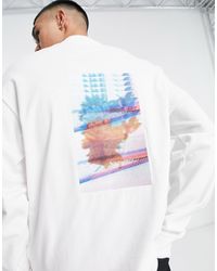 Calvin Klein - T-shirt Met Logo, Lange Mouwen En Bloemprint - Lyst