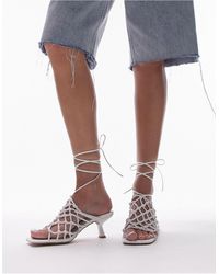 TOPSHOP - Ariel - sandali a gabbia con tacco medio e allacciatura alla caviglia bianchi a pianta larga - Lyst