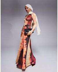 DASKA - Robe longue froncée en jersey à imprimé abstrait - Lyst