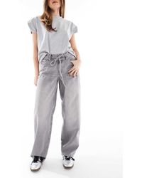 ONLY - Vaqueros Gris Lavado Holgados De Talle Medio Con Lazada En La Cintura Gianna De - Lyst