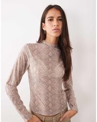 PUMA - Snake Printed Mesh Tee - Lyst