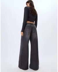 Stradivarius - Flared Jeans Met Lage Taille En Sterren - Lyst