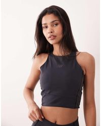 New Balance - Cropped Tank - Lyst