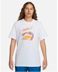 Nike - Camiseta blanca unisex con estampado gráfico - Lyst