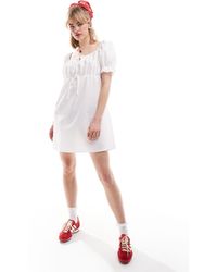 Reclaimed (vintage) - Milkmaid Mini Dress With Puff Sleeve - Lyst