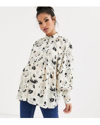 ASOS Top de manga larga transparente con parte delantera abotonada y estampado de florecitas - Multicolor