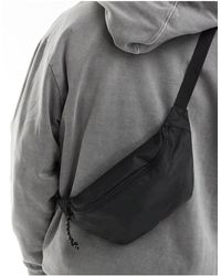 ASOS - Cross Body Bum Bag With Contrast Puller - Lyst