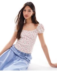 Miss Selfridge - Top milkmaid con stampa floreale a coste - Lyst