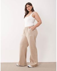 Kaiia - Plus – jogginghose aus baumwollmix - Lyst