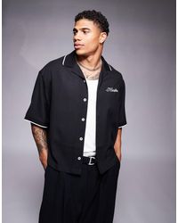 ASOS - Chemise coupe carrée oversize avec col à revers et broderie chainette sur la poitrine - Lyst