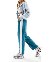 Tommy Hilfiger - Pantaloni sportivi stile college -azzurro - Lyst