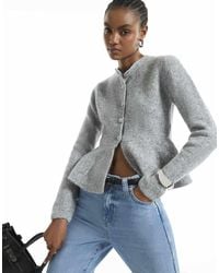 River Island - Knitted Peplum Hem Cardigan - Lyst
