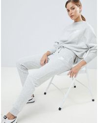 Nike Rally Grey Swoosh Logo Slim Joggers - Gray