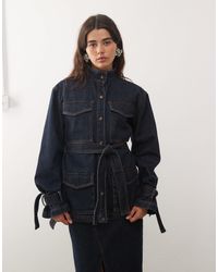 Lioness - Sweetness High Neck Belted Cinch Waist Tie Sleeve Longline Denim Jacket - Lyst