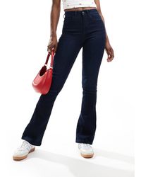 Noisy May - Vaqueros Azules De Corte Acampanado Slim Y Talle Alto Con Lavado Oscuro Sallie De -Azul Marino - Lyst