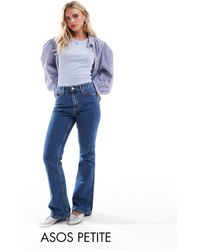 ASOS - Asos Design Petite Mid Rise Flare Jeans - Lyst