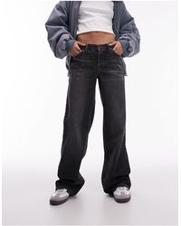 TOPSHOP - Ember - jeans a fondo ampio e vita bassa slavato - Lyst