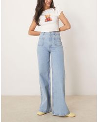 ASOS - High Waist Wide Leg Jeans With Front Pockets - Lyst