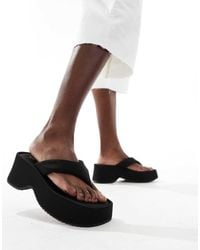 Stradivarius - Sandali Infradito Flatform Neri - Lyst