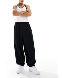 Nike - Club French Terry Oversized joggers - Lyst