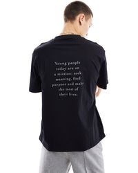 Pull&Bear - T-shirt nera con stampa "find purpose" - Lyst