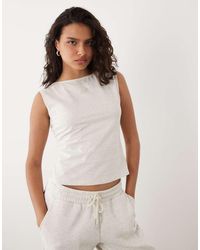 New Balance - Open-back Fitted Tank Top - Lyst