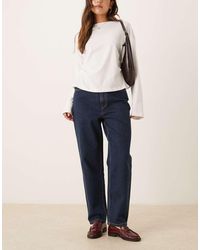 ASOS - Vaqueros Mom Holgados De Talle Alto Con Acabado Enjuagado De -Azul Marino - Lyst