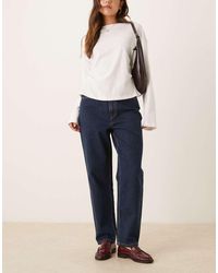 ASOS - Ruimvallende Mom Jeans Met Hoge Taille En Spoeling - Lyst