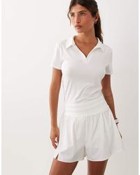 4505 - Active Short Sleeve Tennis Polo Top - Lyst